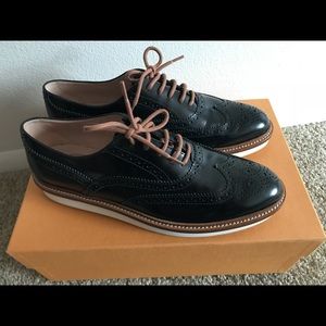 TOD'S glossed-leather brogues